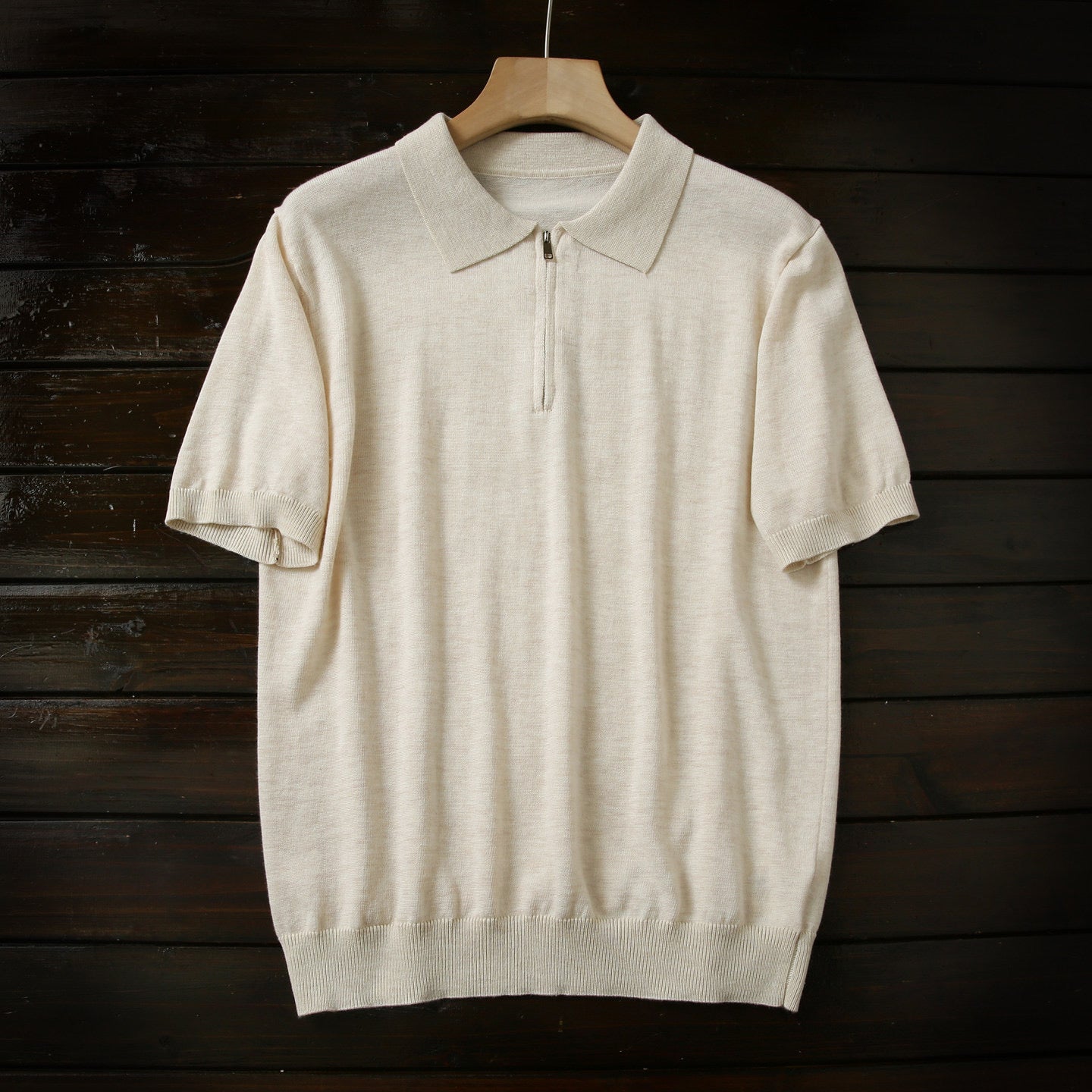 Polo de lana tejido con cremallera a medio pecho