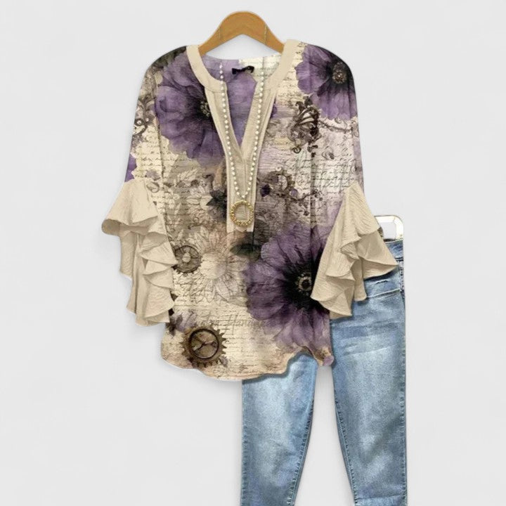 Aurelia – Blusa de manga volante con diseño llamativo