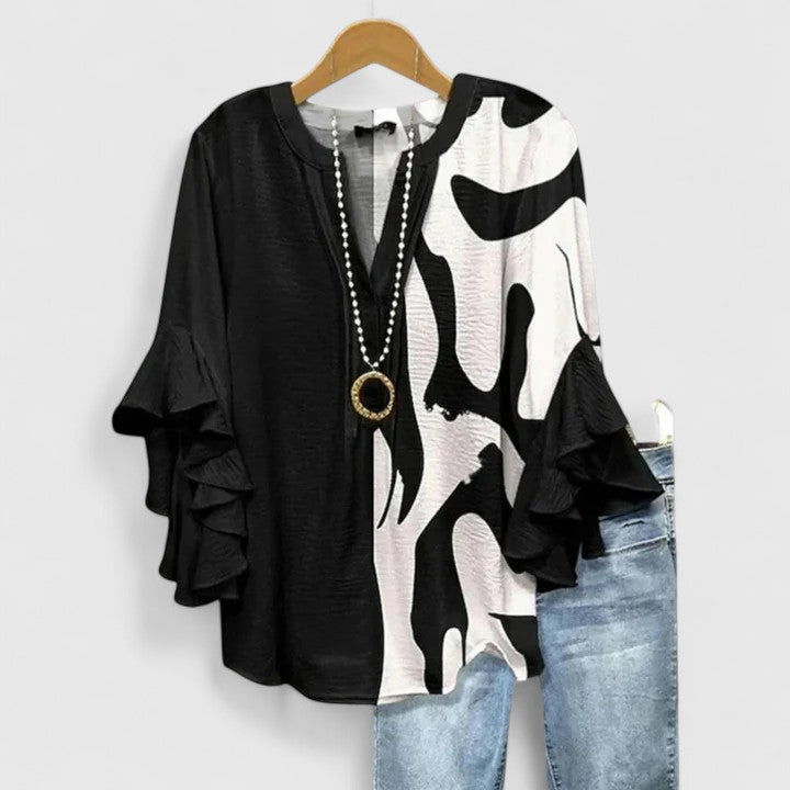 Aurelia – Blusa de manga volante con diseño llamativo