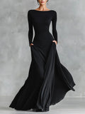 Adele - Vestido largo moderno en crepé negro con escote en barco y pliegues