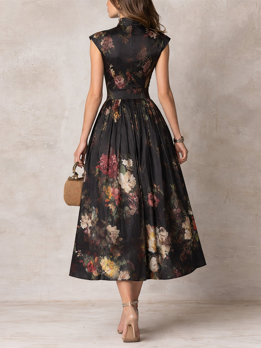 Patricia | Vestido midi de satén negro con estampado floral y plisado