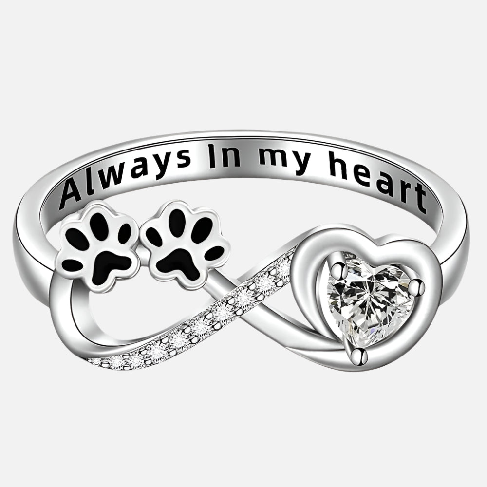 Anillo con circonitas en forma de pata con diseño de corazón e infinito