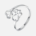 Anillo artesanal con pata y corazón